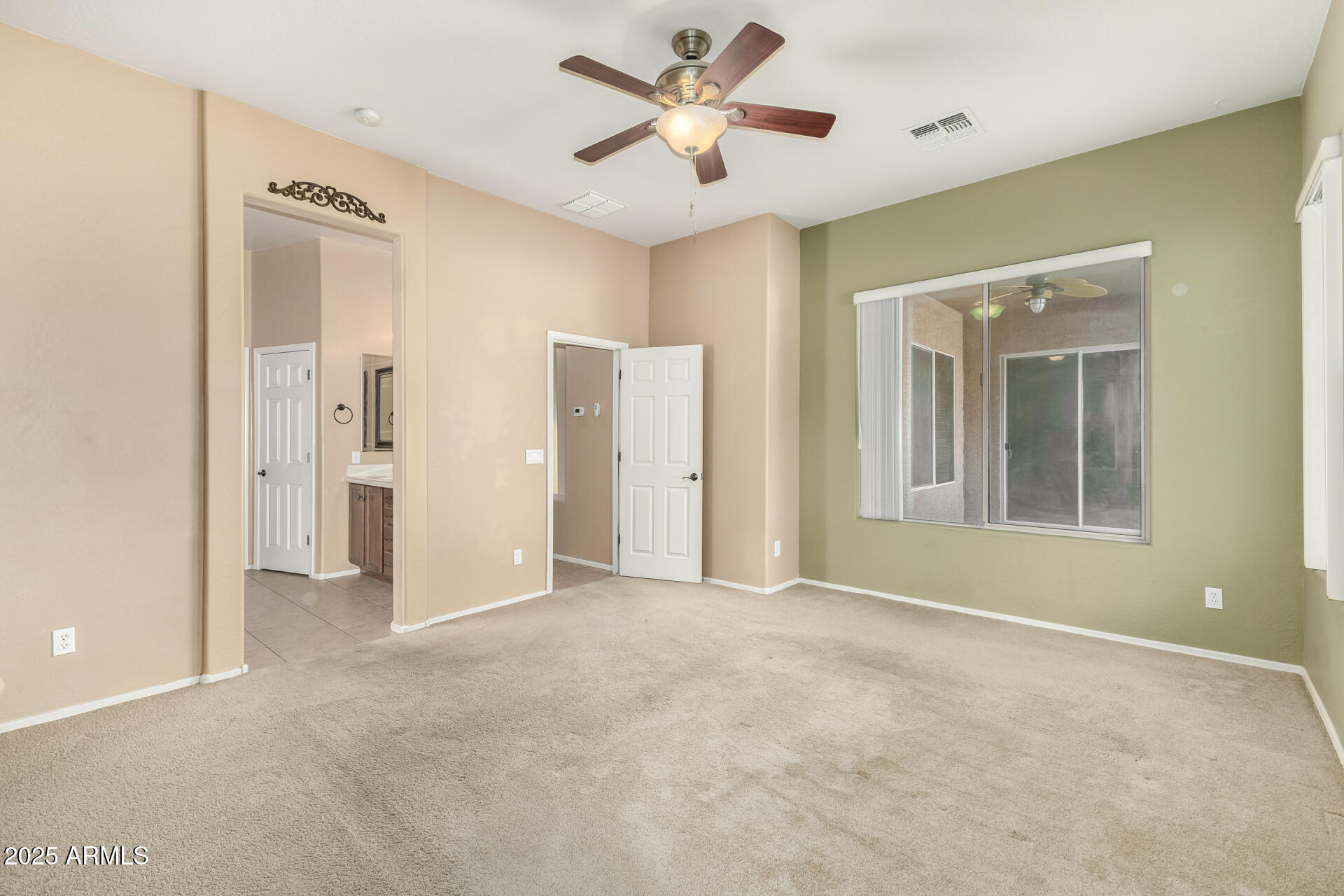 35819 North 33rd Lane Phoenix, AZ 85086 - Photo 21 of 50 a view of an empty room with a window