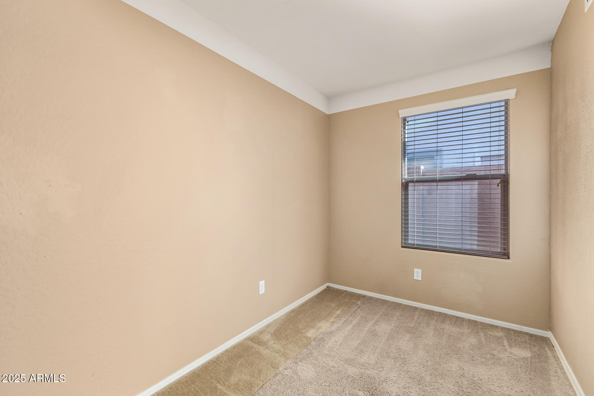 35819 North 33rd Lane Phoenix, AZ 85086 - Photo 30 of 50 a view of an empty room with a window