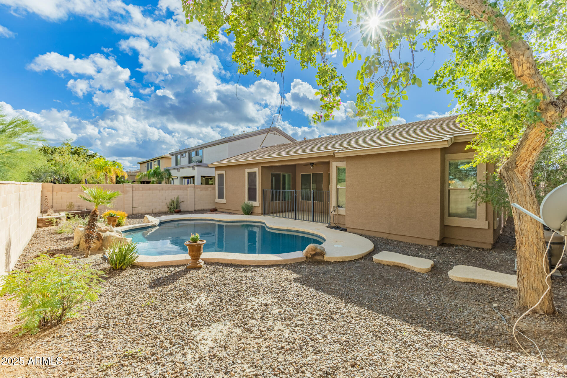 35819 North 33rd Lane Phoenix, AZ 85086 - Photo 39 of 50 a view of a house with a yard and sitting area