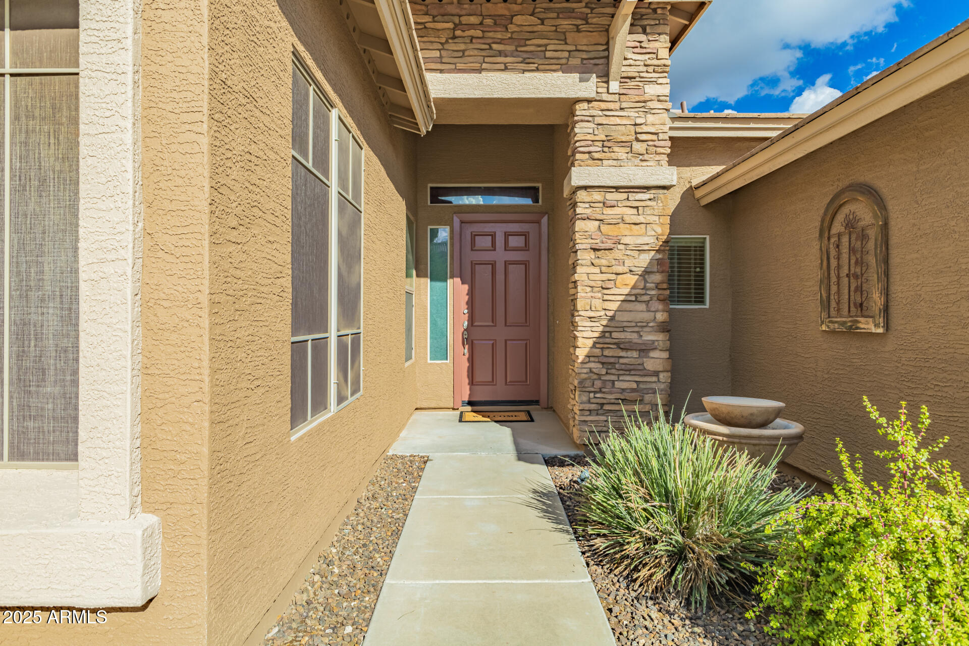 35819 North 33rd Lane Phoenix, AZ 85086 - Photo 4 of 50 a front view of a house with a door