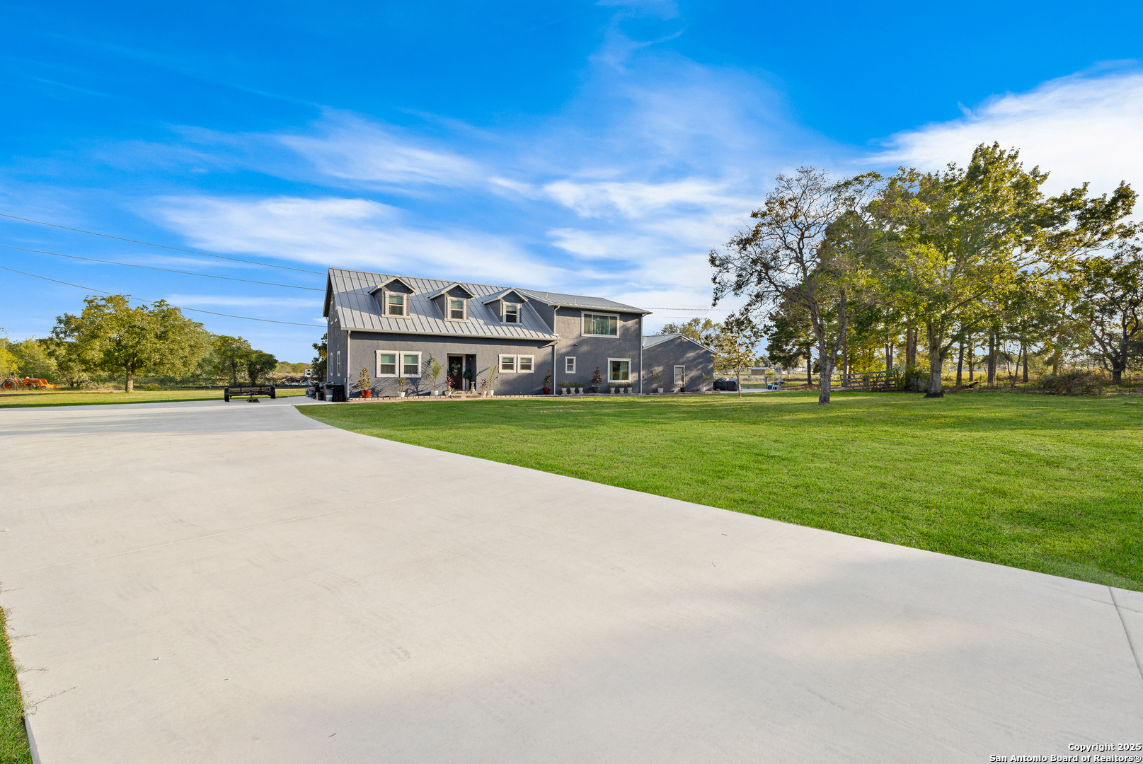 a view of a house with a big yard