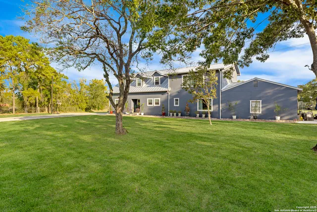 a house view with a garden space