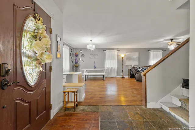 a view of a livingroom with furniture and a fireplace