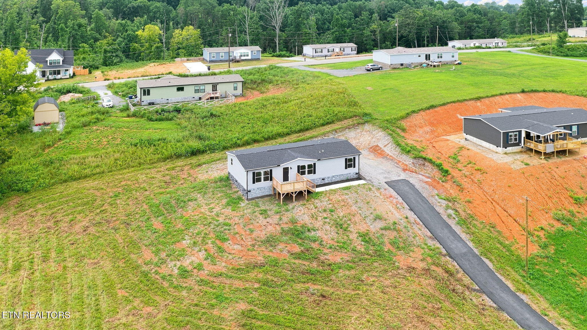 200 Laura Boling Loop Road Strawberry Plains, TN 37871 - Photo 2 of 45 2-web-or-mls-002_DJI_20260727131231_0342