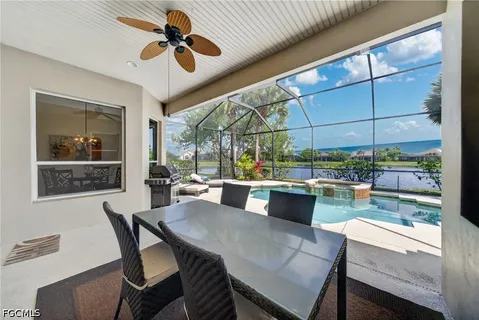 a view of a swimming pool with a patio