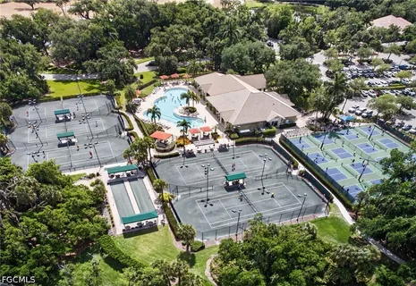 an aerial view of a house with a swimming pool