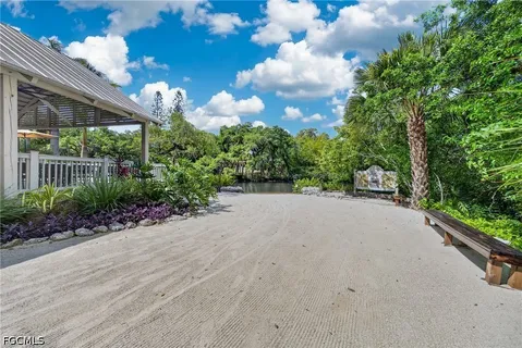 a view of a chairs and table in a patio