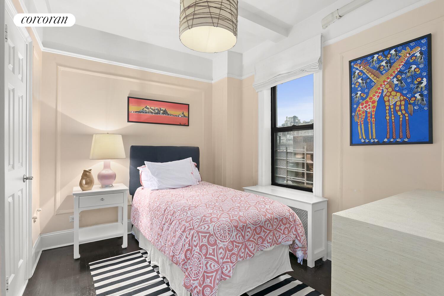 65 East 96th Street, Unit 7D Manhattan, NY 10128 - Photo 11 of 12 a bedroom with a bed and a painting on the wall