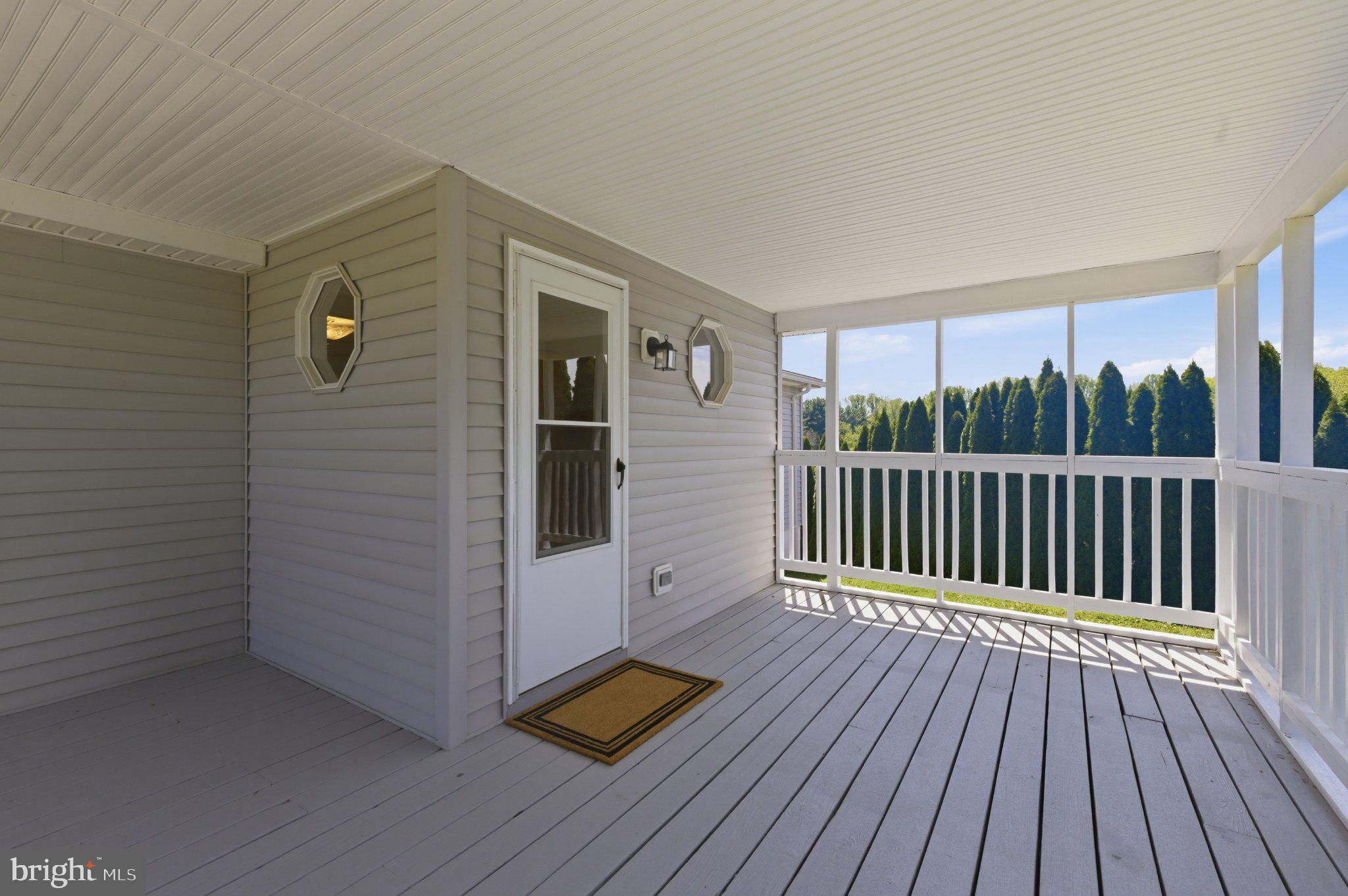 3624 Kemptown Church Road Monrovia, MD 21770 - Photo 17 of 68 Charming back porch with serene views.