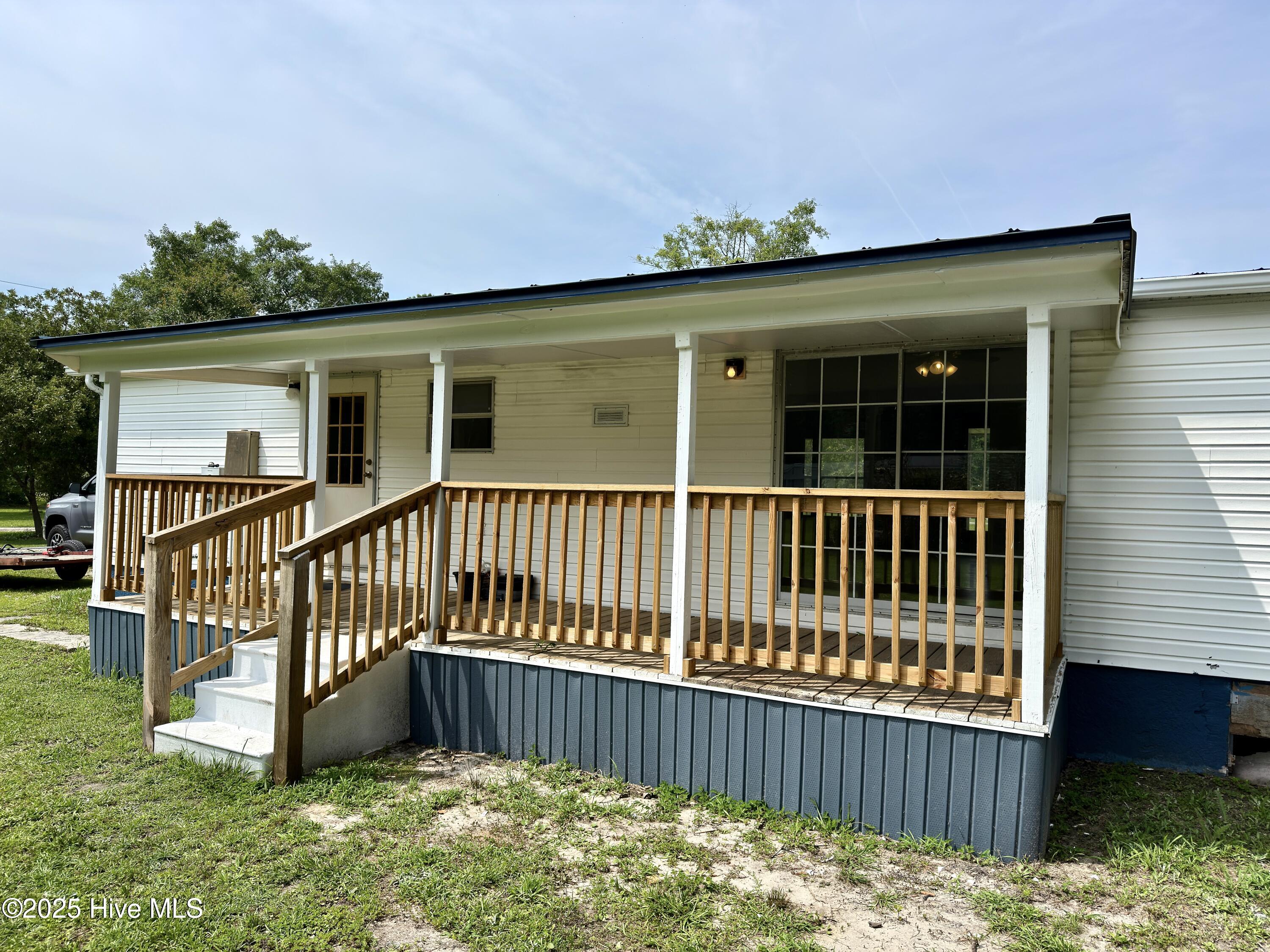 184 Hardison Road Holly Ridge, NC 28445 - Photo 18 of 22 Back covered porch