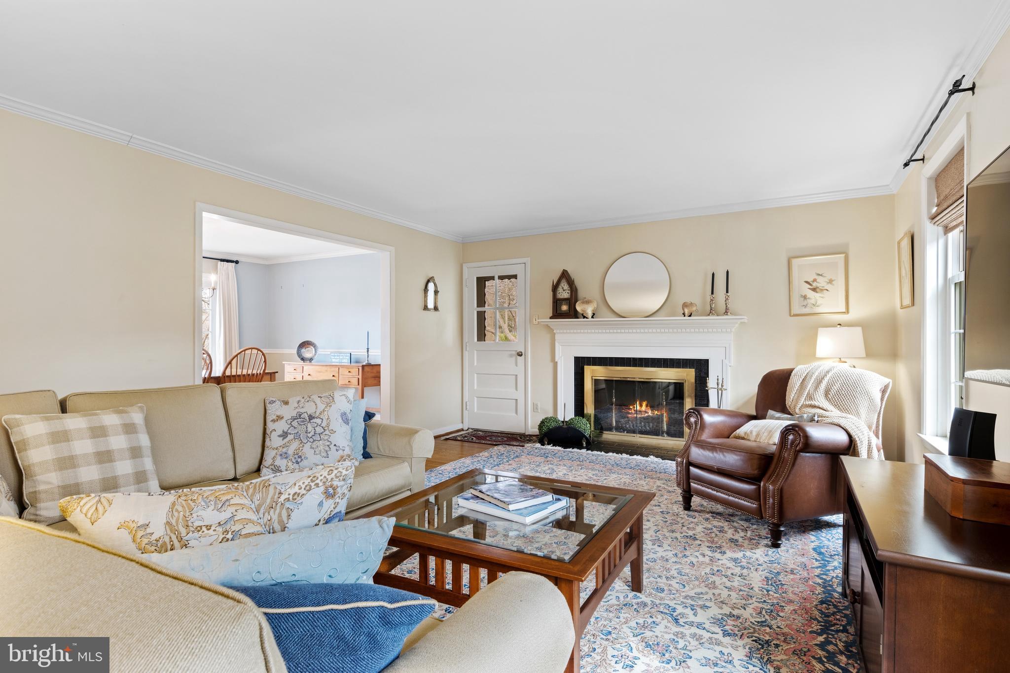 653 Baron Dekalb Road Wayne, PA 19087 - Photo 12 of 32 a living room with furniture and a fireplace
