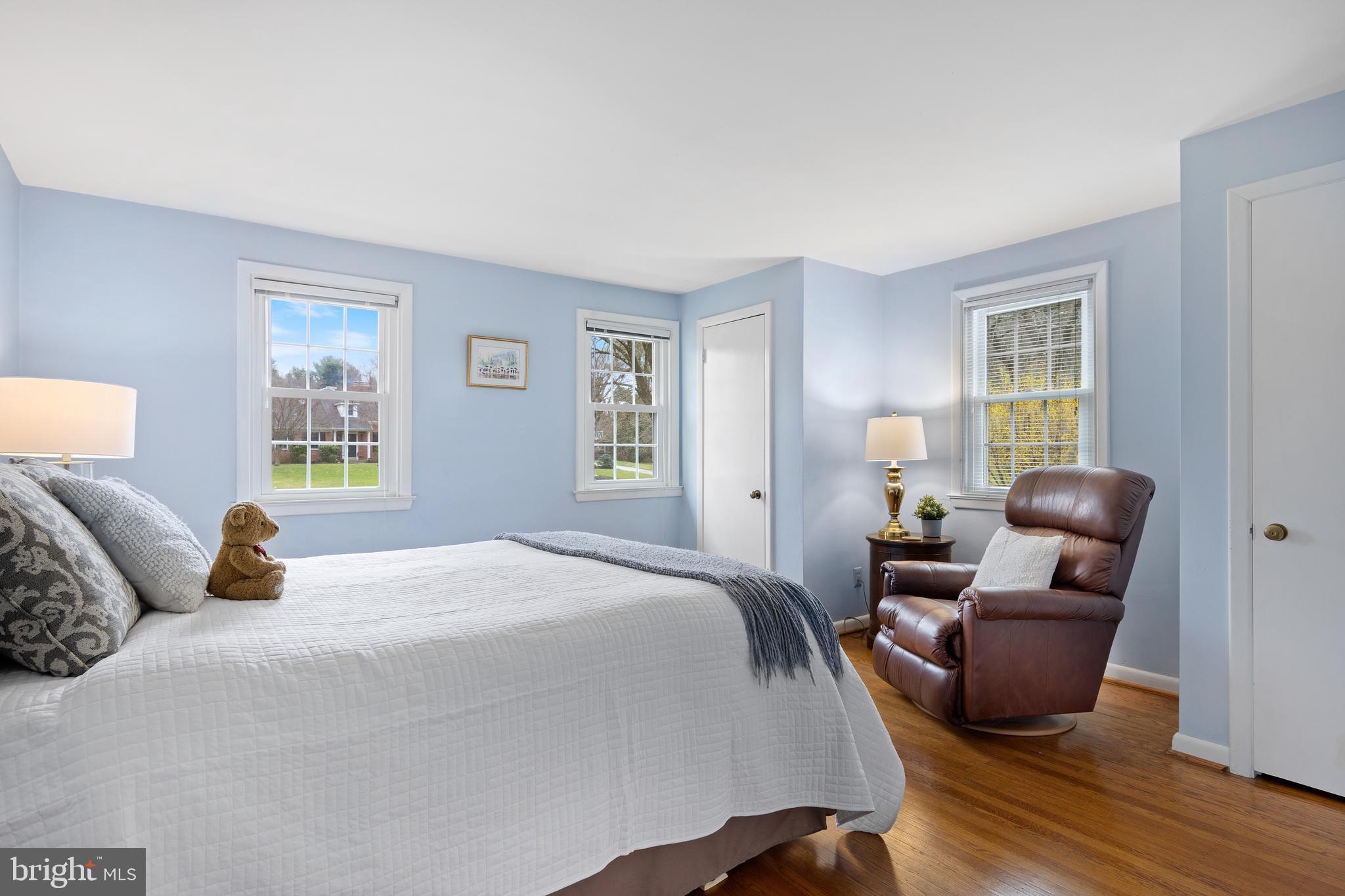 653 Baron Dekalb Road Wayne, PA 19087 - Photo 23 of 32 a bedroom with a bed and wooden floor