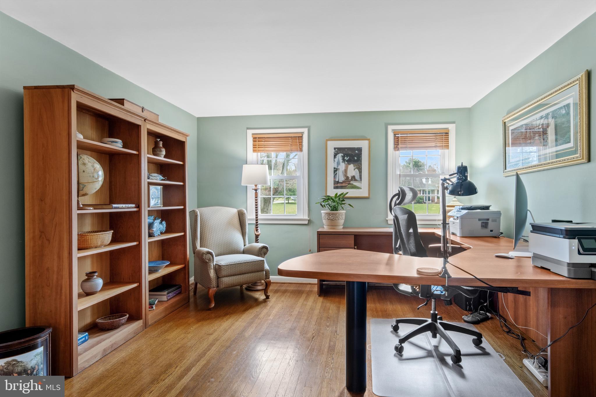 653 Baron Dekalb Road Wayne, PA 19087 - Photo 24 of 32 a view of a workspace with furniture and a bookshelf