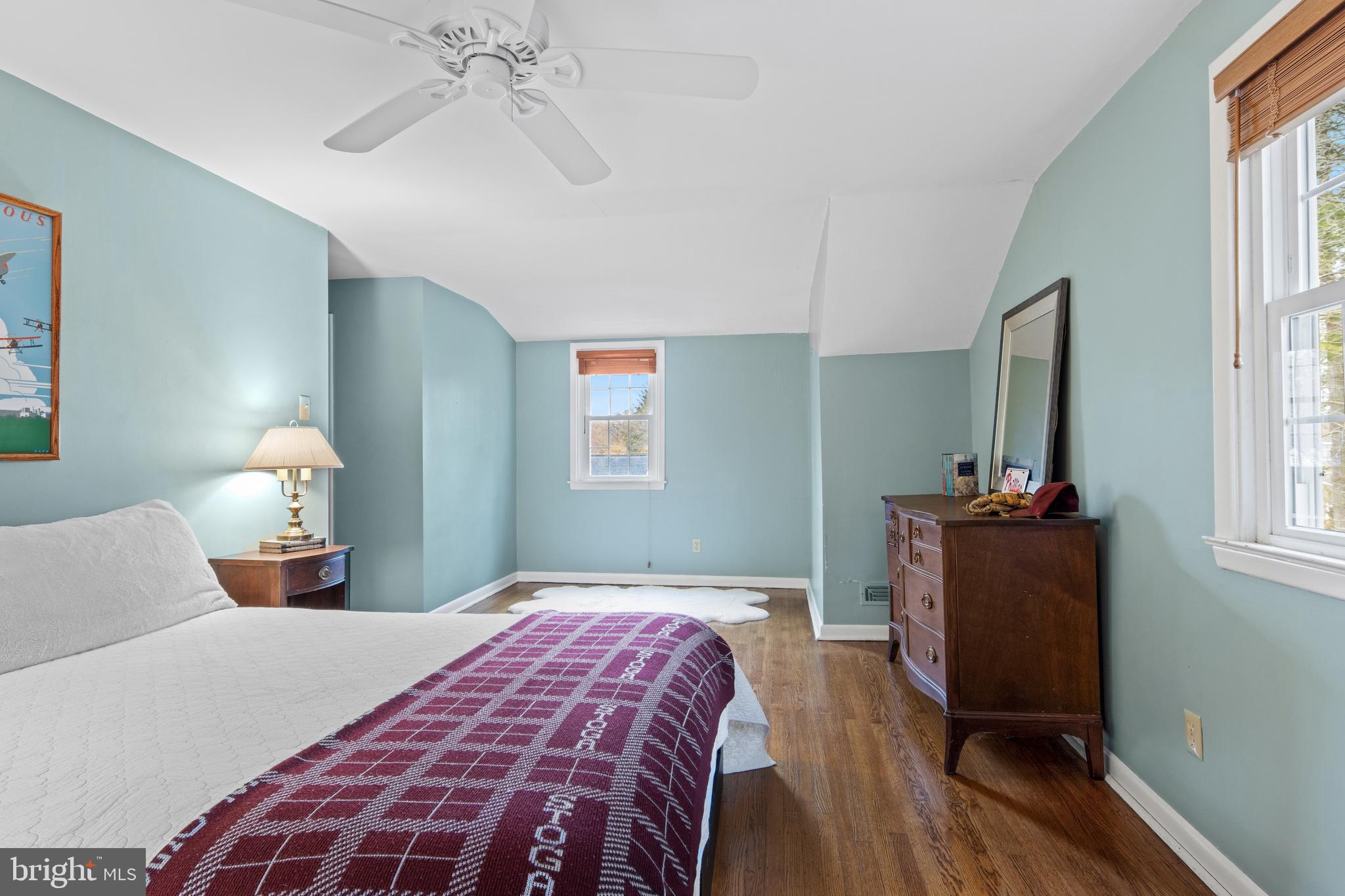 653 Baron Dekalb Road Wayne, PA 19087 - Photo 27 of 32 a bedroom with a bed and wooden floor