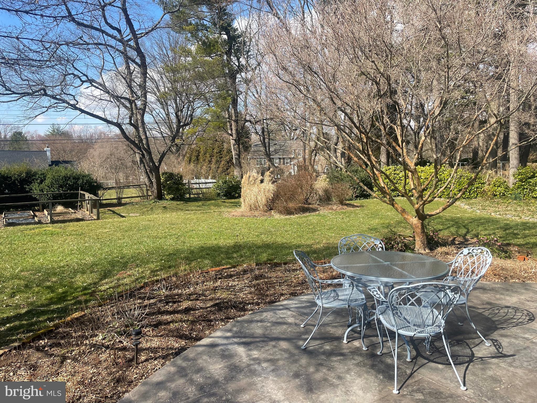 653 Baron Dekalb Road Wayne, PA 19087 - Photo 6 of 32 a view of a table and chairs in the garden