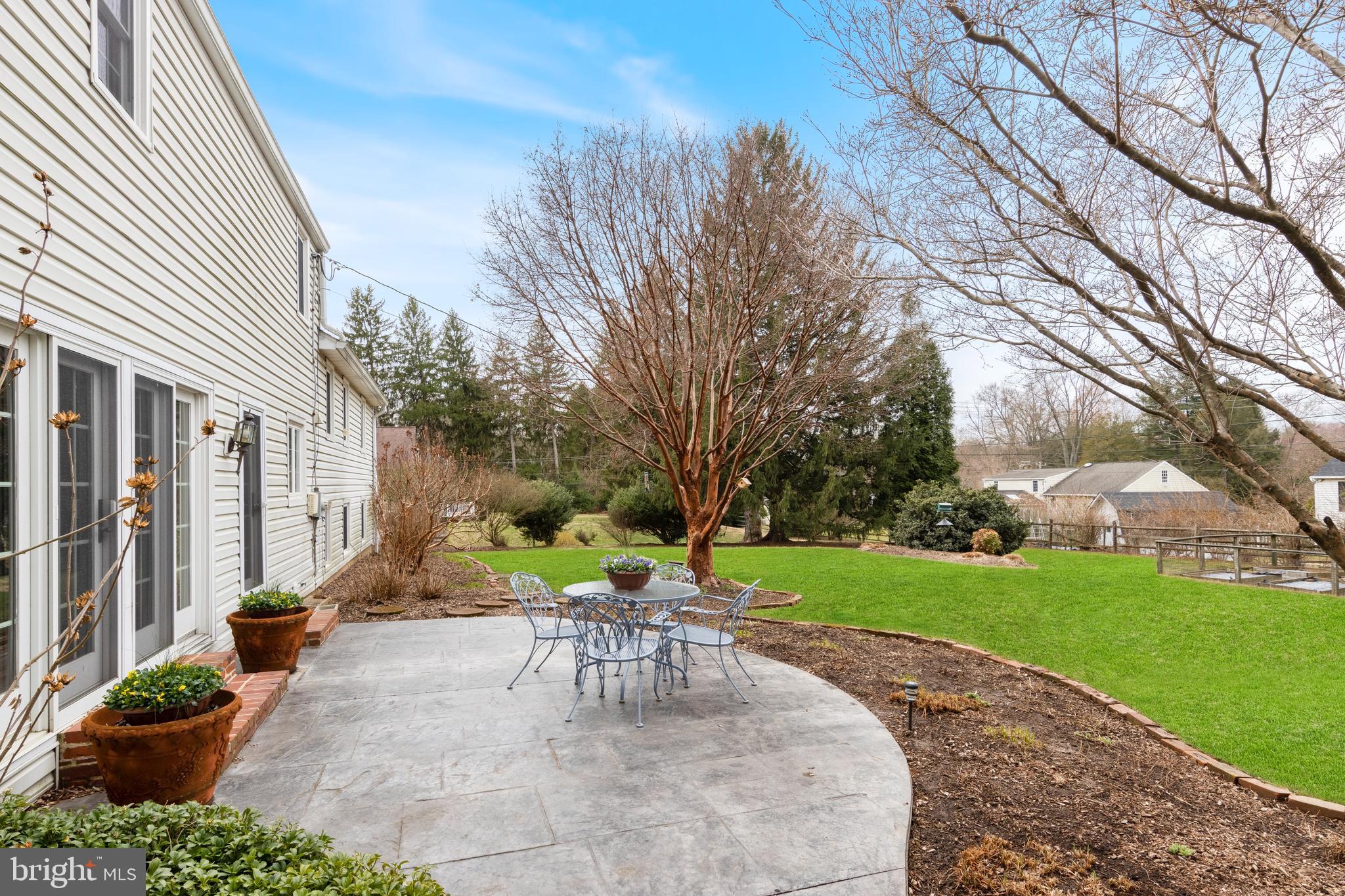 653 Baron Dekalb Road Wayne, PA 19087 - Photo 7 of 32 a view of a backyard with sitting area