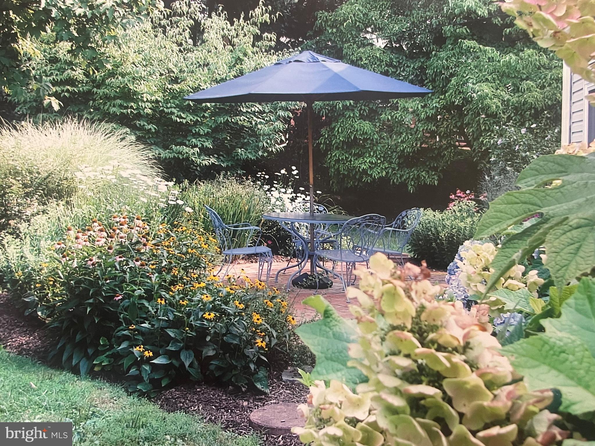 653 Baron Dekalb Road Wayne, PA 19087 - Photo 10 of 32 a backyard of a house with lots of green space