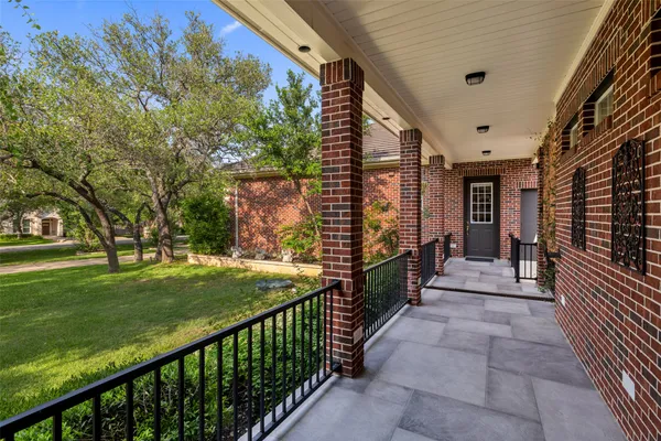 a view of a porch with a backyard