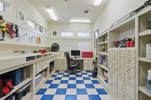 a kitchen with a cabinets and window