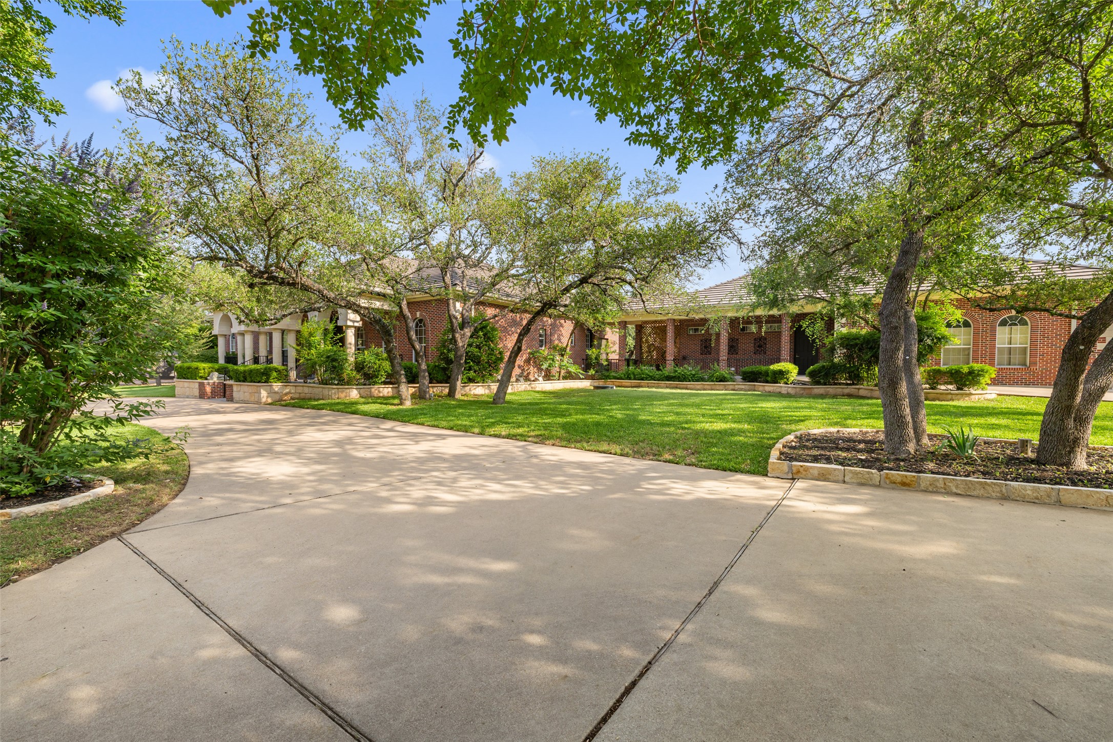 118 Lido Street Austin, TX 78734 - Photo 4 of 40 a view of road with yard