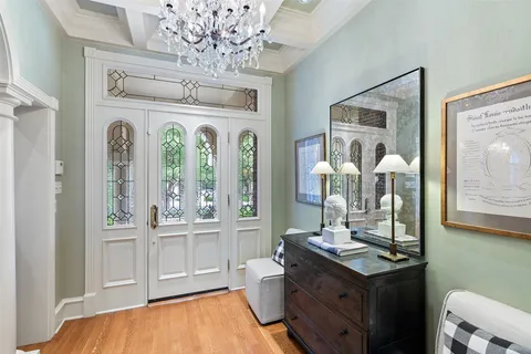 a bathroom with a sink a mirror and a toilet