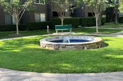 a view of a house with a swimming pool