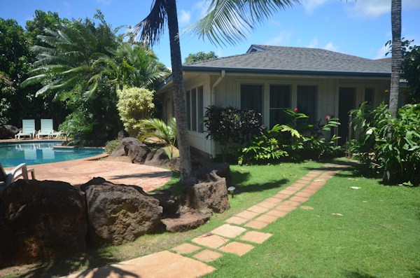 2231 Pane Road Koloa, HI 96756 - Photo 13 of 25 a view of a house with backyard and garden