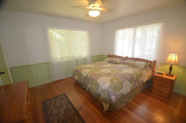 2231 Pane Road Koloa, HI 96756 - Photo 18 of 25 a bedroom with a bed and window