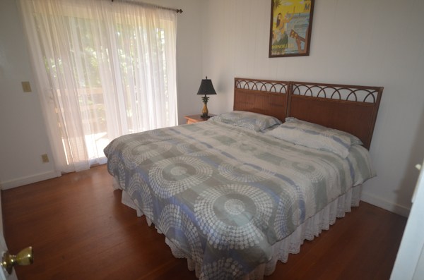 2231 Pane Road Koloa, HI 96756 - Photo 9 of 25 a bedroom with a bed and a window