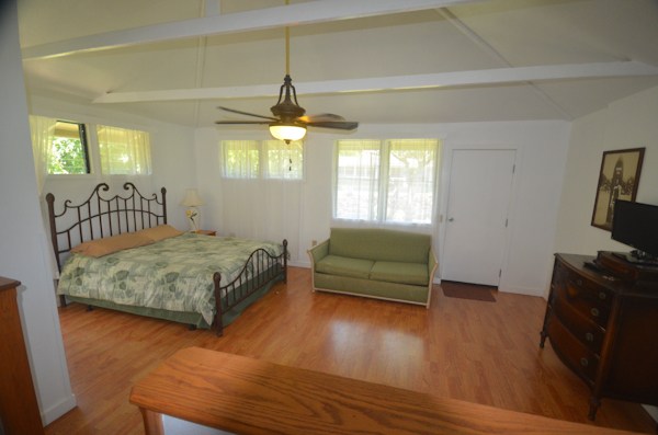 2231 Pane Road Koloa, HI 96756 - Photo 10 of 25 a bedroom with a bed and a flat screen tv