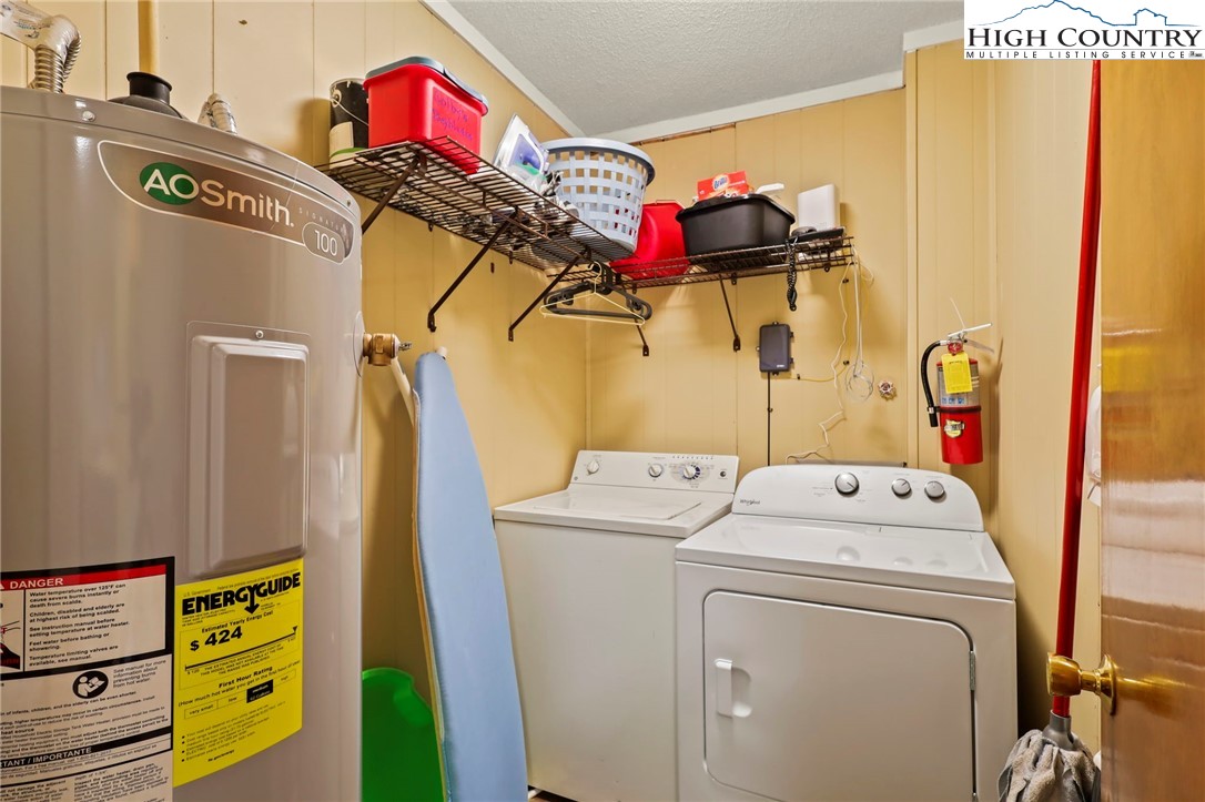 301 Pinnacle Inn Road, Unit 3305 Beech Mountain, NC 28604 - Photo 16 of 29 a utility room with dryer and washer
