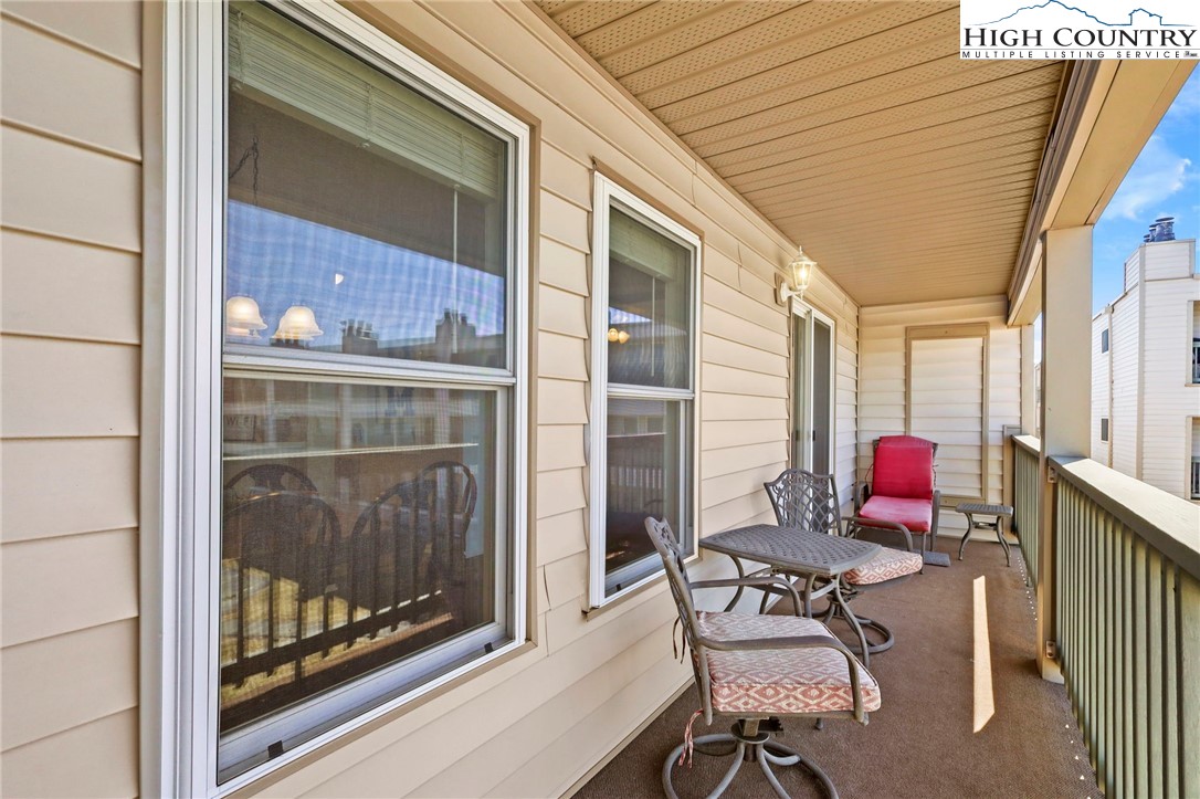 301 Pinnacle Inn Road, Unit 3305 Beech Mountain, NC 28604 - Photo 18 of 29 a patio with glass door and glass door