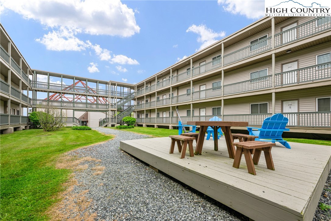 301 Pinnacle Inn Road, Unit 3305 Beech Mountain, NC 28604 - Photo 21 of 29 a view of a building with sitting area