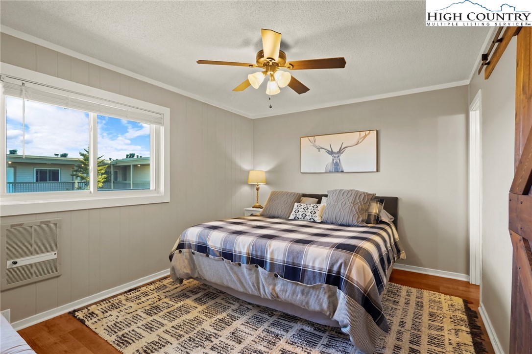 301 Pinnacle Inn Road, Unit 3305 Beech Mountain, NC 28604 - Photo 4 of 29 a bedroom with a bed and a window