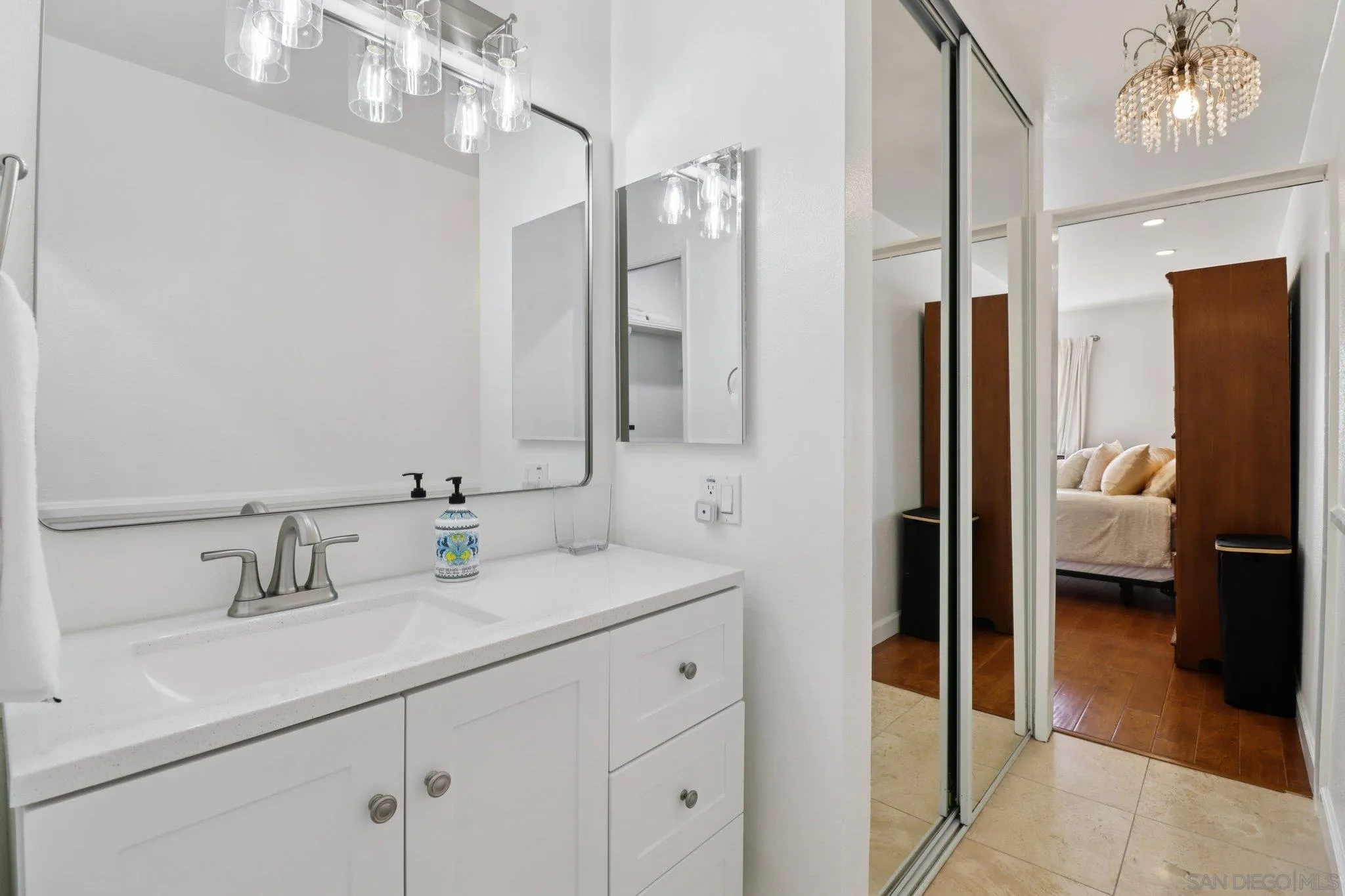 816 Caminito Azul Carlsbad, CA 92011 - Photo 16 of 41 a en suite bathroom with double sink and a mirror