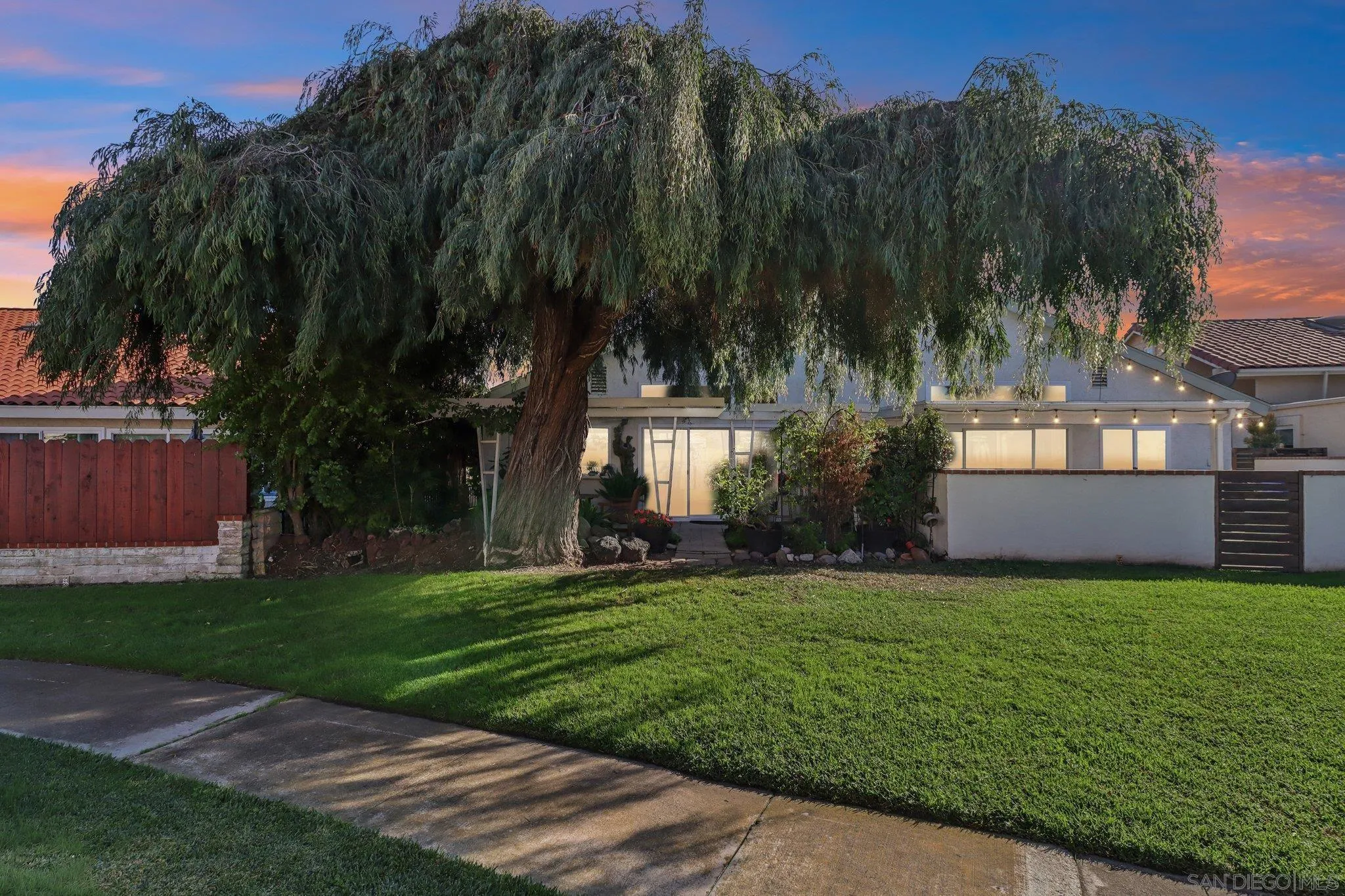 816 Caminito Azul Carlsbad, CA 92011 - Photo 2 of 41 a view of a house with a yard