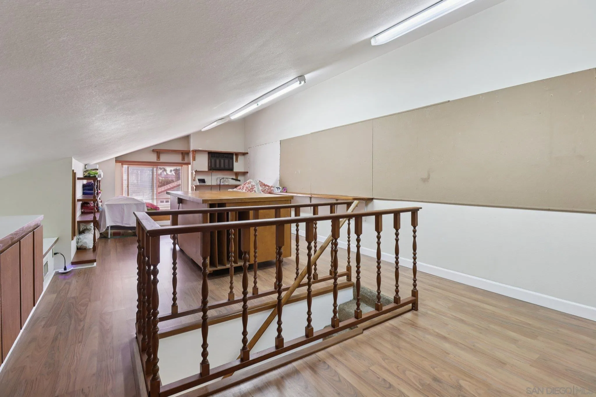 816 Caminito Azul Carlsbad, CA 92011 - Photo 26 of 41 a kitchen with stainless steel appliances granite countertop a stove and a wooden floors