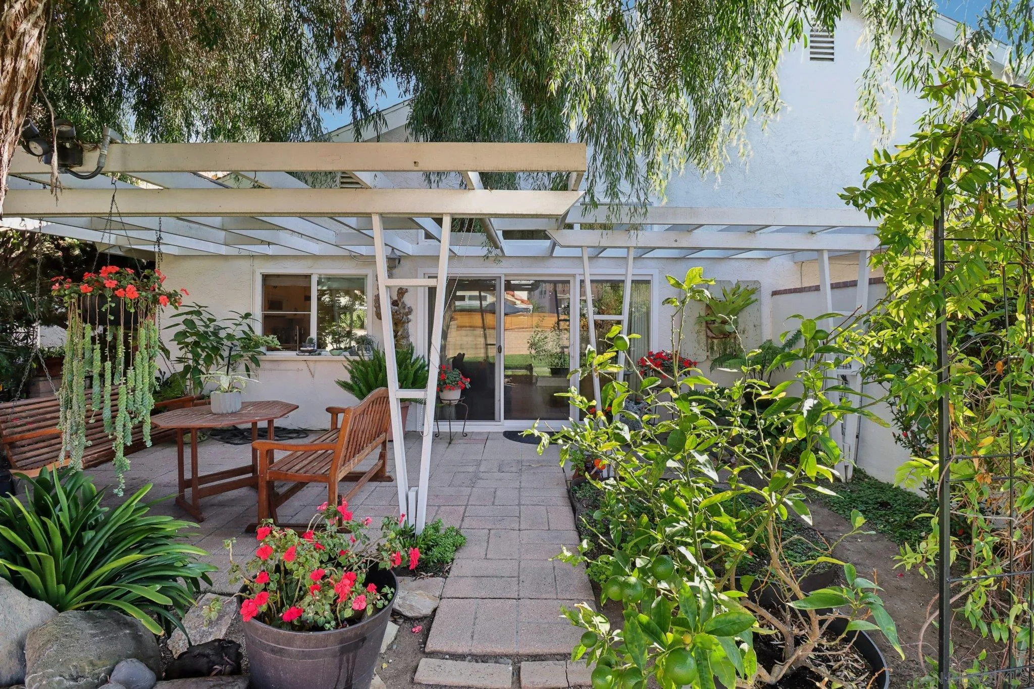 816 Caminito Azul Carlsbad, CA 92011 - Photo 30 of 41 a view of a building with sitting area