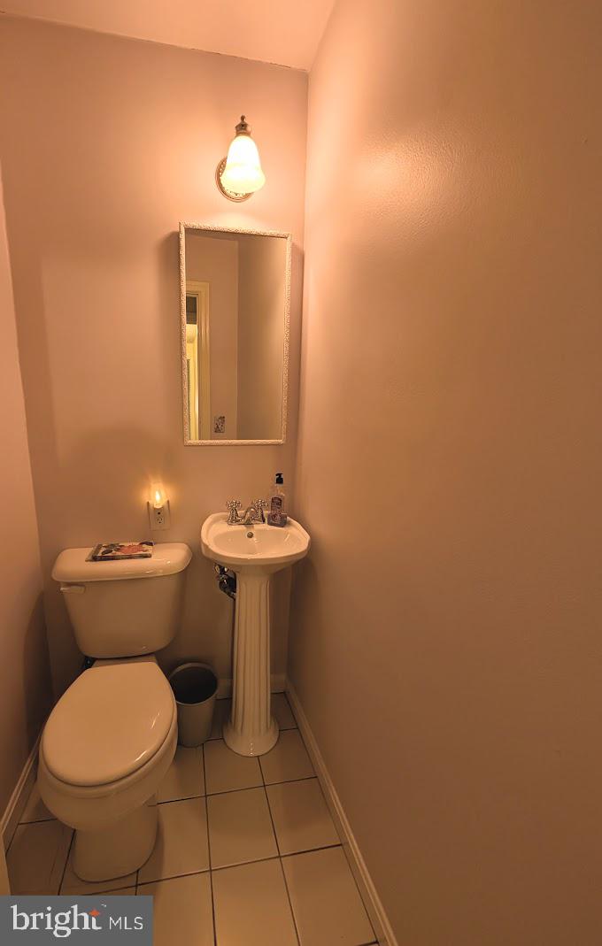 411 Devon Road Camp Hill, PA 17011 - Photo 25 of 33 a bathroom with a sink toilet and a mirror