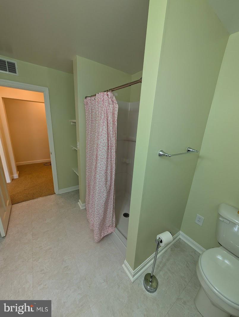 411 Devon Road Camp Hill, PA 17011 - Photo 29 of 33 a bathroom with a shower and toilet