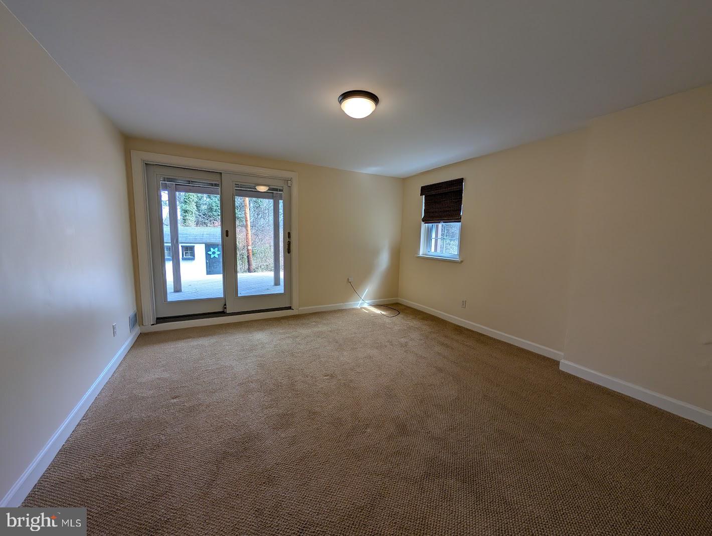 411 Devon Road Camp Hill, PA 17011 - Photo 32 of 33 an empty room with windows and entrance