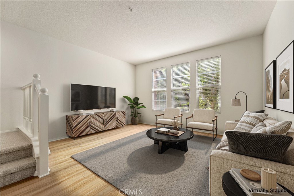Great room - digitally enhanced with virtual staging