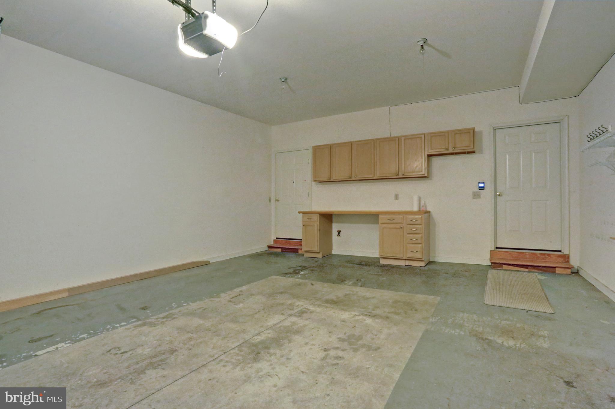 4605 Deer Path Road Harrisburg, PA 17110 - Photo 19 of 21 Garage Storage and Rear Entry(inside)