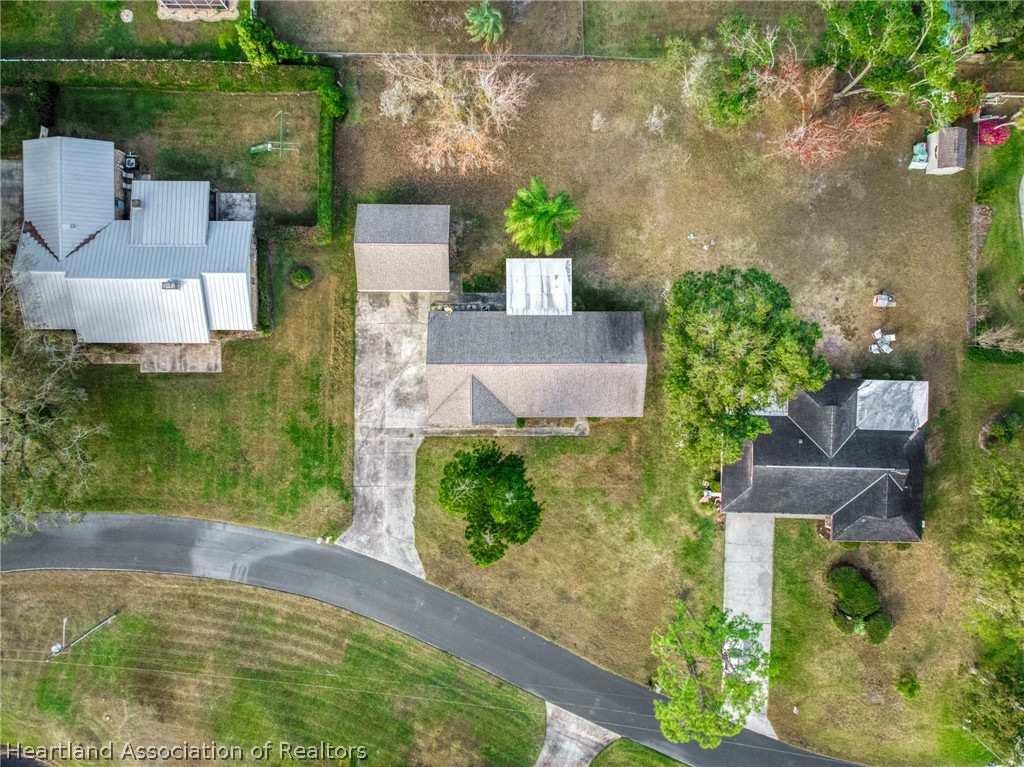 3407 Divot Road Sebring, FL 33872 - Photo 38 of 39 an aerial view of a house with a yard
