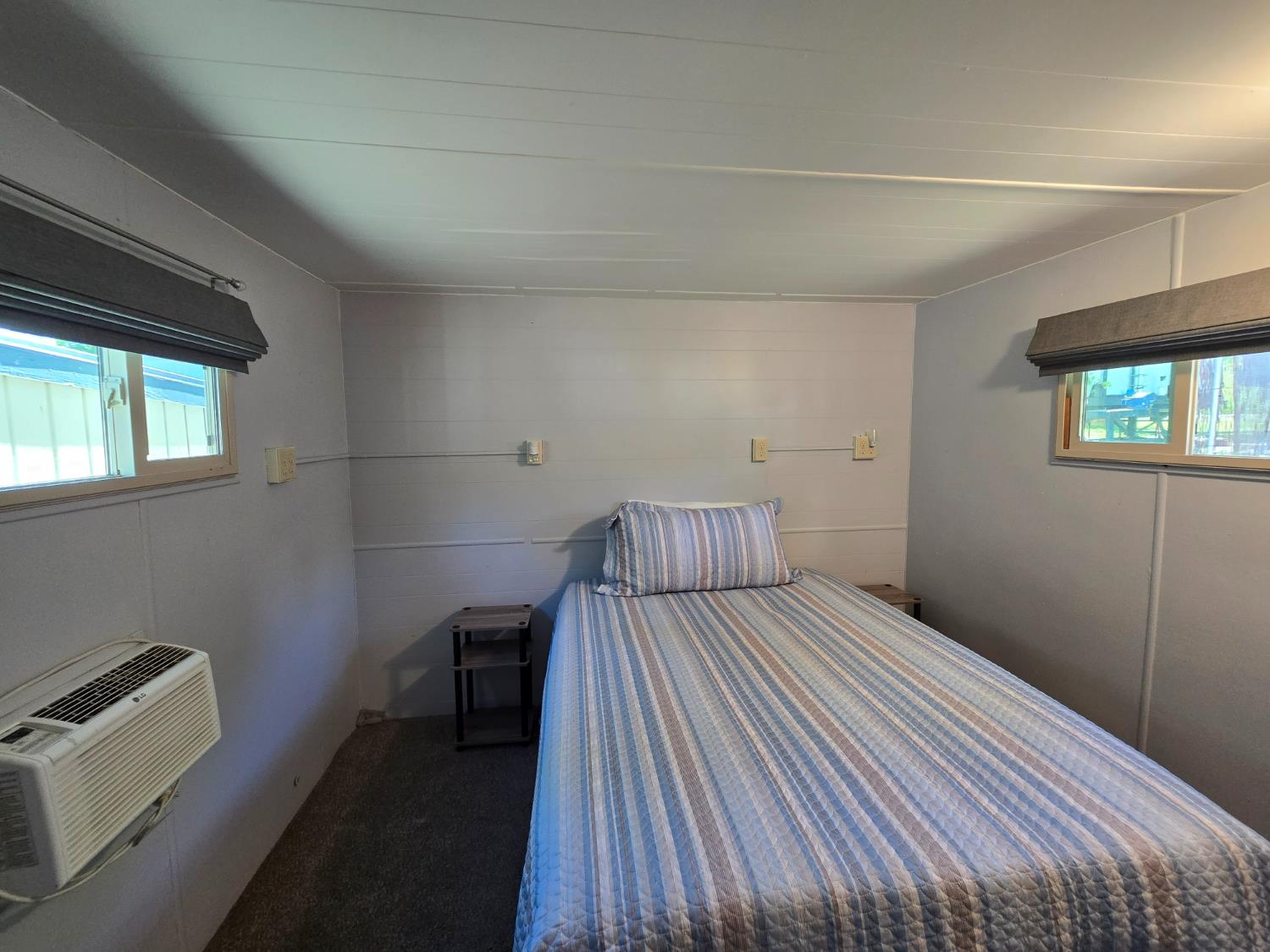1525 Cold Springs Road, Unit 16 Placerville, CA 95667 - Photo 18 of 38 Good sized primary bedroom with plenty of outlets--double bed with dual nightstands and plenty of room to add storage/closet or armoire.