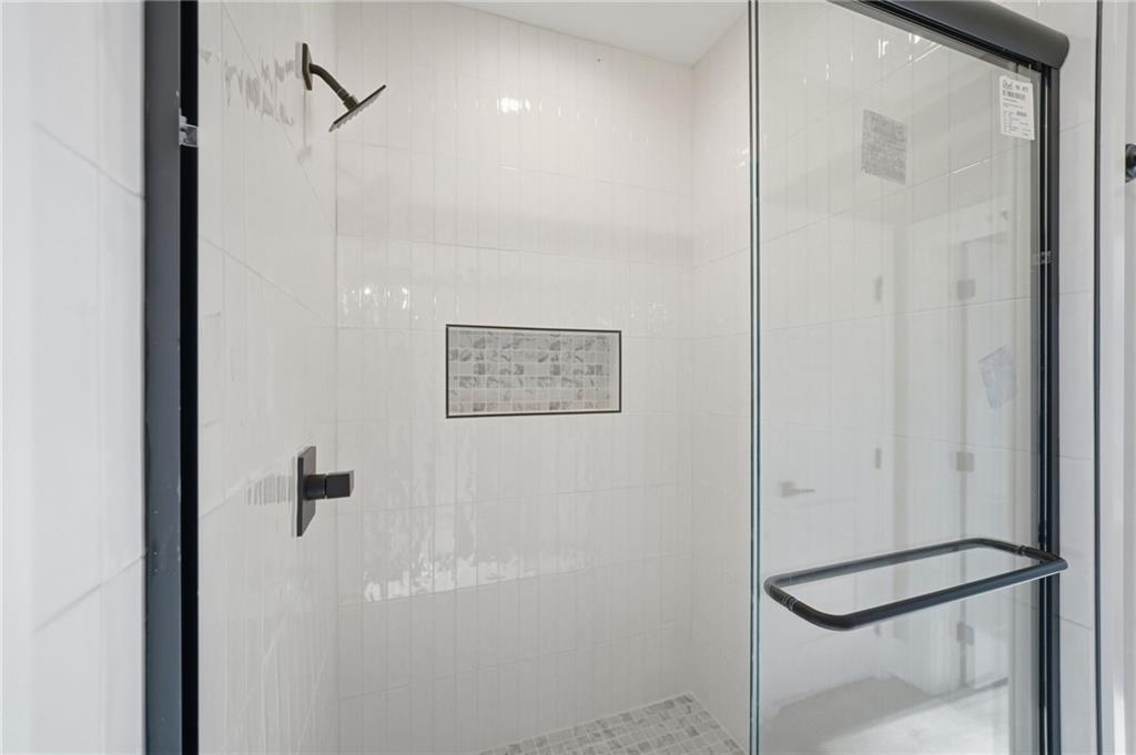 1176 Jewel Court Northeast Ranger, GA 30734 - Photo 24 of 53 a bathroom with a shower