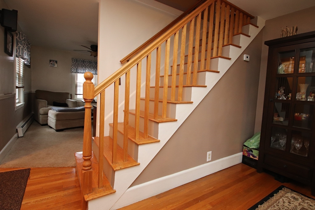 18 Nason Road Saugus, MA 01906 - Photo 13 of 31 a view of entryway with wooden floor and stairs