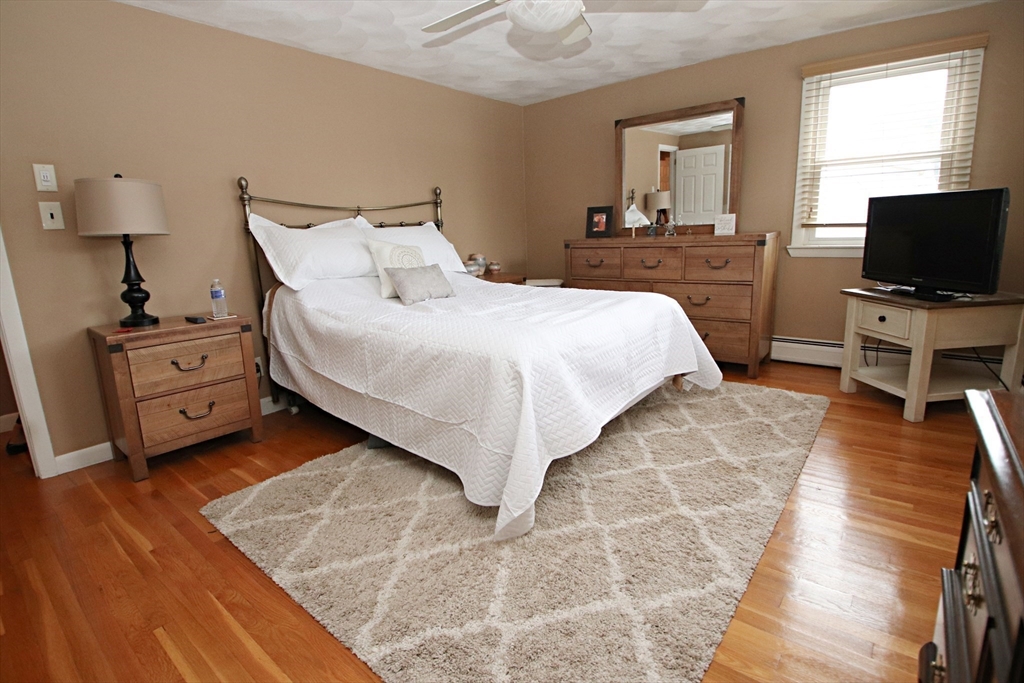 18 Nason Road Saugus, MA 01906 - Photo 15 of 31 a bedroom with a bed and a flat screen tv