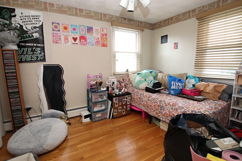 18 Nason Road Saugus, MA 01906 - Photo 18 of 31 a bedroom with bed and a window