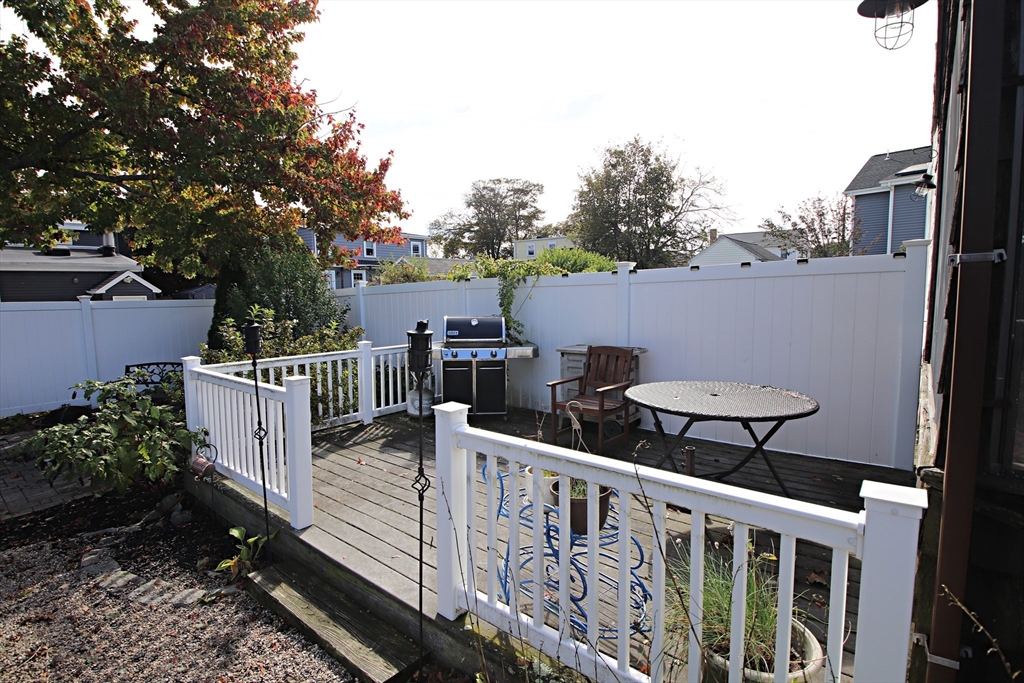 18 Nason Road Saugus, MA 01906 - Photo 25 of 31 a view of a balcony with wooden floor and fence